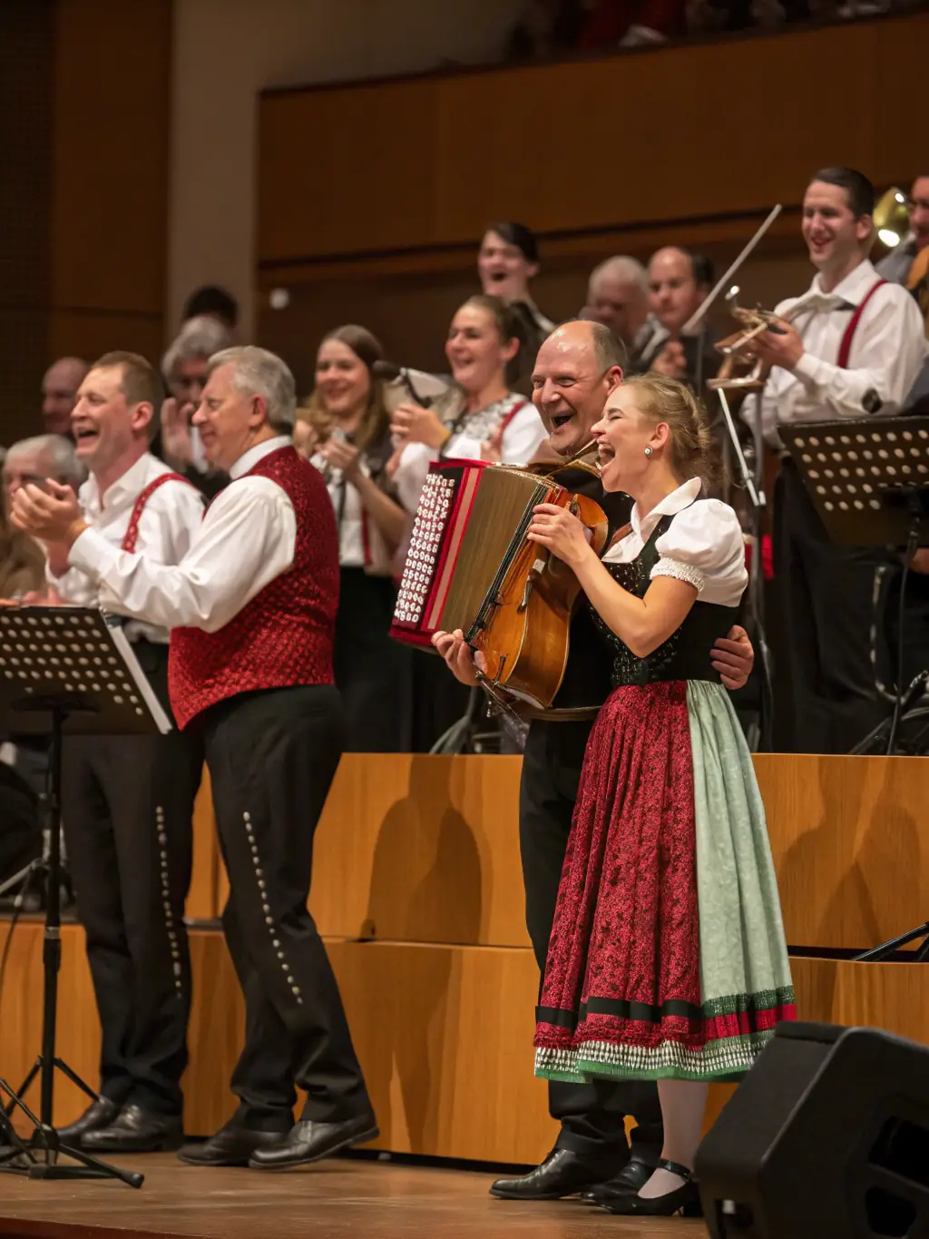 A captivating shot of a CAP MUSIK concert featuring talented musicians performing on stage, with an appreciative audience enjoying the performance in a concert hall.